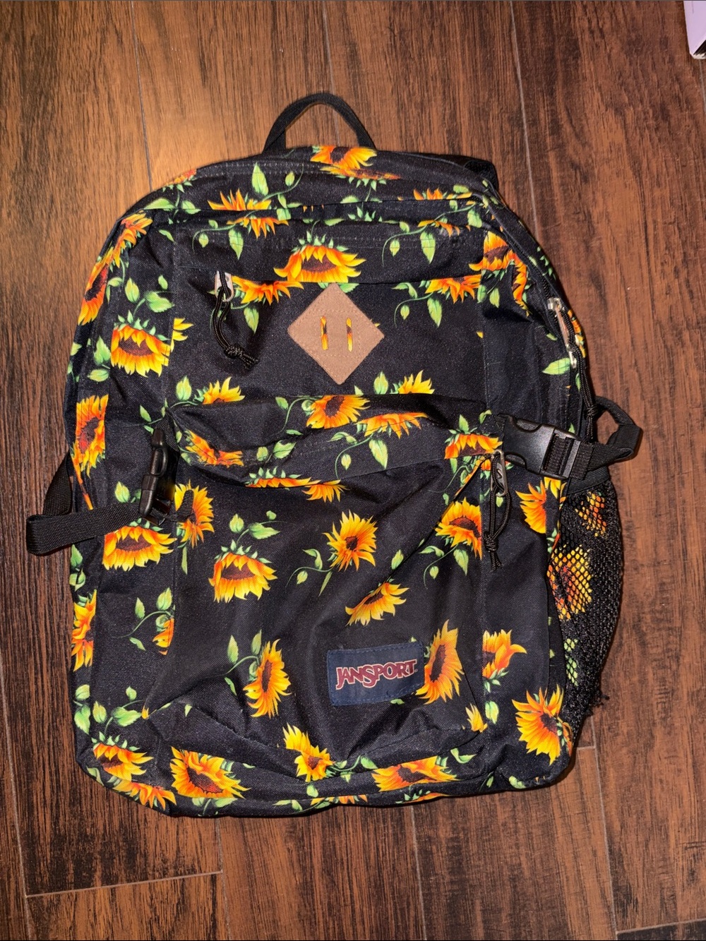 Jansport Black Backpack with Yellow Sunflower Print
